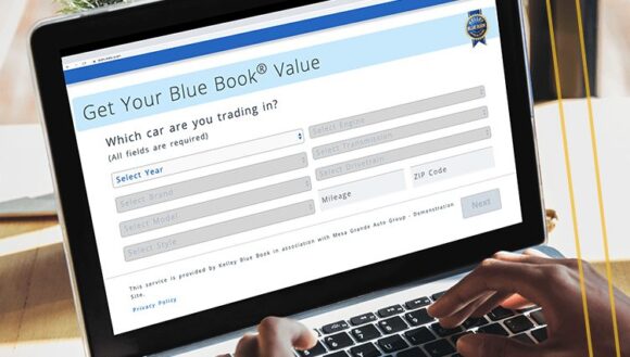 Car shopper looking "Get your Blue Book Value" screen on dealership website through LeadDriver